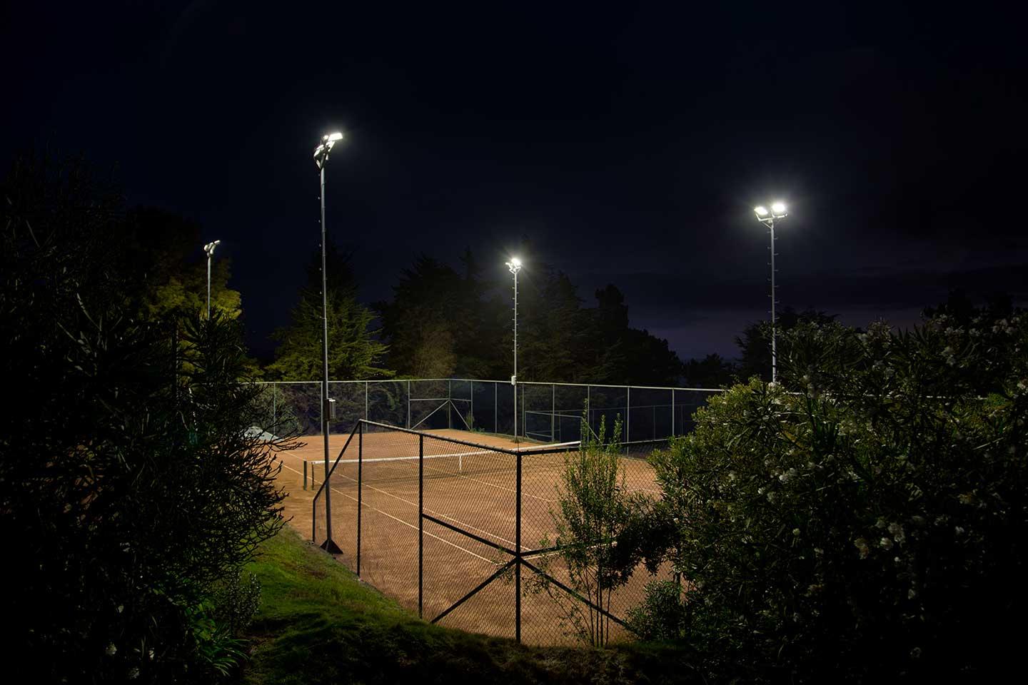 Schréder sports lighting solution provides perfect visibility on the tennis courts at Cantagua club house with zero light spill for residents